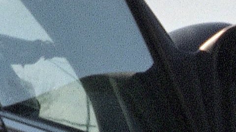 California Highway Patrol officer Rob Lund gives Virginia Luk of Temple City, Calif., a warning for exceeding the speed limit on Interstate 210 in Altadena, California on Sunday, Dec. 17, 1995. Lund says that the CHP will be strictly enforcing the new speed limits. (AP Photo/Mark J. Terrill)