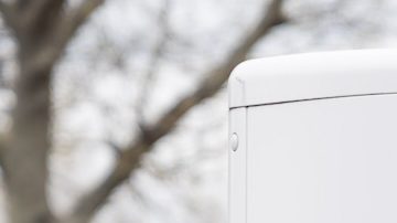 Estación de carga automática Tesla, cargando varios modelos Tesla.