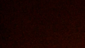 A firefighter beats back flames with a shovel as brush burns around him at a fire fanned by Santa Ana winds in Fontana, Calif. on Wednesday, Oct. 22, 2008. At least 100 acres have burned in a wildfire that broke out Wednesday morning amid hot and gusty weather in San Bernardino County, east of Los Angeles. (AP Photo/Dan Steinberg)