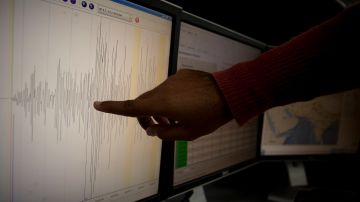 A Pakistani meteorologist at a local met office in Islamabad, Pakistan, on Wednesday, Jan. 19, 2011, points to seismographic data showing the intensity an earthquake which hit Pakistan early Wednesday. The 7.2 magnitude quake struck at 1:30 a.m. local time Wednesday in a remote area some 200 miles (320 kilometers) southwest of the Baluchistan provincial capital of Quetta, not far from the Afghan border and sent some thousands running from their homes in panic damaging homes close to the epicenter, but caused no casualties, officials said. (AP Photo/B.K.Bangash)