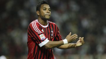 AC Milan Brazilian forward Robinho gestures after scoring during a Serie A soccer match between AC Milan and Cagliari at the San Siro stadium in Milan, Italy, Saturday , May 14, 2011. (AP Photo/Luca Bruno)