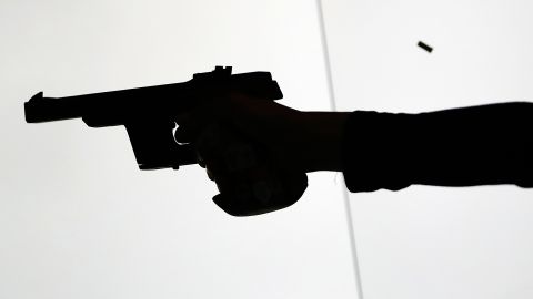 An athlete competes during the women's 25 meter pistol qualification precision competition at Olympic Shooting Center at the 2016 Summer Olympics in Rio de Janeiro, Brazil, Tuesday, Aug. 9, 2016. (AP Photo/Eugene Hoshiko)