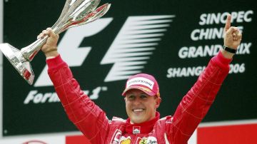 FILE - In this Oct. 1, 2006 file photo, Germany's Michael Schumacher celebrating winning the Formula One Chinese Grand Prix auto race at the Shanghai International Circuit in Shanghai, China. Schumacher's family, in a statement Wednesday, Jan. 2, 2019, has asked for understanding as it continues to keep details of his health private ahead of the seven-time Formula One champion's 50th birthday. Schumacher suffered serious head injuries in an accident while he was skiing with his teenage son Mick in the French Alps at Meribel on Dec. 29, 2013. (AP Photo/Greg Baker, File)
