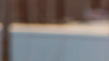 Los Angeles County Sheriff's deputies walk in a procession behind a coroner's van transporting the body of fallen Deputy Joseph Gilbert Solano to the Los Angeles County Department of Medical Examiner-Coroner after a news conference announcing his death, Wednesday, June 12, 2019, in Los Angeles. Solano, who had been on life support, died Wednesday afternoon after being shot in an off-duty attack at a fast-food restaurant on Monday. (AP Photo/Damian Dovarganes)