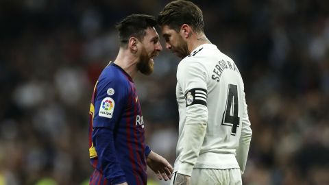 FILE - In this March 2, 2019 file photo, Barcelona forward Lionel Messi, left, goes head to head with Real defender Sergio Ramos as they argue during the Spanish La Liga soccer match between Real Madrid and FC Barcelona at the Bernabeu stadium in Madrid. The Spanish football league on Wednesday Oct. 16. 2019, has asked the Spanish football federation to change the location of the match between Barcelona and Real Madrid to avoid it coinciding with plans for a separatist rally. The league wants the federation to shift the match to Madrid. (AP Photo/Manu Fernandez, File)