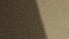 Familihulp Nurse Khadija El Ariani puts on her working apron after doing the shopping for her client and former Belgian sailor Danny Delmotte, 62, right, during a partial lockdown to prevent the spread of COVID-19 in Brussels, Tuesday, April 21, 2020. While shops, restaurants and schools remain closed in Belgium due to the coronavirus many home health care workers still travel to take care of their clients.(AP Photo/Francisco Seco)