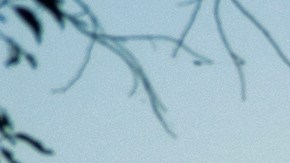 The sun sets over downtown Los Angeles behind the Sixth Street Bridge, a viaduct connecting the downtown Arts District with the historic Boyle Heights neighborhood, in Los Angeles during opening ceremonies for on Saturday, July 9, 2022. (AP Photo/Richard Vogel)