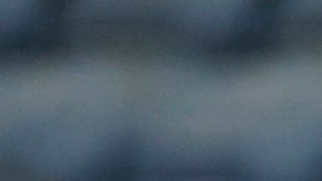 Greece's Giorgos Giakoumakis, center, attempts a shot at goal between Gibraltar's Kian Ronan, left, and Julian Valarino during the Euro 2024 group B qualifying soccer match between Gibraltar and Greece at the Algarve stadium outside Faro, Portugal, Friday, March 24, 2023. (AP Photo/Joao Matos)