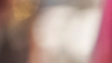 Sorelly Restrepo, of Colombia, shields herself from the sunlight in the Little Tokyo district of Los Angeles, Thursday, July 27, 2023. July has been so hot thus far that scientists calculate that this month will be the hottest globally on record and likely the warmest human civilization has seen, even though there are several days left to sweat through. (AP Photo/Damian Dovarganes)