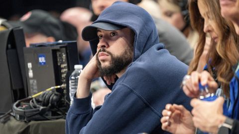 Puerto Rican recording artist Bad Bunny sits courtside during game 6 of an NBA basketball first-round playoff series between the Dallas Mavericks and the Los Angeles Clippers Friday, May 3, 2024, in Dallas. (AP Photo/Jeffrey McWhorter)