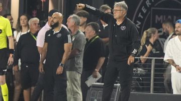 Inter Miami head coach Gerardo "Tata" Martino watches during the second half of an MLS soccer match against D.C. United, Saturday, May 18, 2024, in Fort Lauderdale, Fla. (AP Photo/Lynne Sladky)