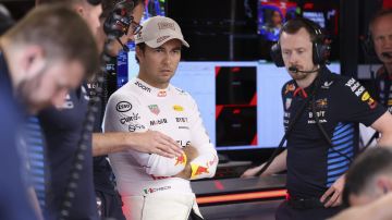 Red Bull driver Sergio Perez of Mexico is in garage before the qualifying session ahead of the Formula One Monaco Grand Prix at the Monaco racetrack, in Monaco, Saturday, May 25, 2024. (Claudia Greco/Pool Photo via AP)