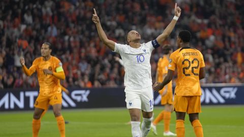 FILE - France's Kylian Mbappe, centre, celebrates after scoring his side's opening goal during the Euro 2024 group B qualifying soccer match between The Netherlands and France at the Johan Cruyff ArenA stadium in Amsterdam, Netherlands, Friday, Oct. 13, 2023. (AP Photo/Peter Dejong, File)