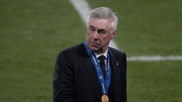 Real Madrid's head coach Carlo Ancelotti walks on the field after the Champions League final soccer match between Borussia Dortmund and Real Madrid at Wembley stadium in London, Saturday, June 1, 2024. Real Madrid won 2-0. (AP Photo/Dave Shopland)