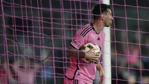 Inter Miami forward Lionel Messi recovers the ball from the St. Louis City goal after Inter Miami forward Luis Suarez (9) scored a goal during the first half of an MLS soccer match Saturday, June 1, 2024, in Fort Lauderdale, Fla. (AP Photo/Rebecca Blackwell)