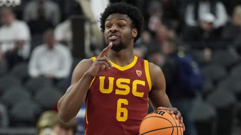 FILE - Southern California's Bronny James (6) brings the ball up the court during the first half of an NCAA college basketball game against Washington in the first round of the Pac-12 tournament Wednesday, March 13, 2024, in Las Vegas. It’s unclear where the son of NBA great LeBron James might land in this month’s NBA draft. (AP Photo/John Locher, File)