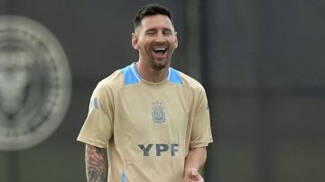 Forward Lionel Messi laughs during a training session for Argentina's national soccer team ahead of the Copa America soccer tournament, Wednesday, June 5, 2024, in Fort Lauderdale, Fla. The 16-nation tournament will be played in 14 U.S. cities starting with Argentina's opener in Atlanta on June 20, 2024. (AP Photo/Rebecca Blackwell)