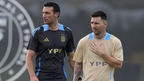 Argentina national soccer team head coach Lionel Scaloni, left, and forward Lionel Messi watch a drill during a training session ahead of the Copa America soccer tournament, Wednesday, June 5, 2024, in Fort Lauderdale, Fla. The 16-nation tournament will be played in 14 U.S. cities starting with Argentina's opener in Atlanta on June 20, 2024. (AP Photo/Rebecca Blackwell)