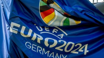 A tarp showing the logo of the Euro 2024 is pictured in the fan zone at the river Main in Frankfurt, Germany, Friday, June 7, 2024. (AP Photo/Michael Probst)