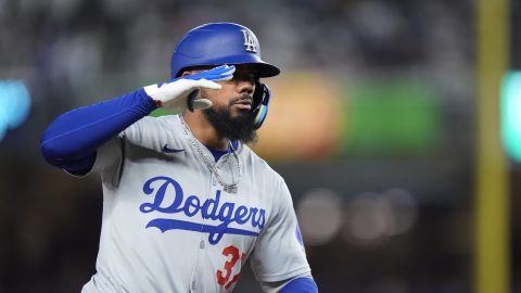 Los Angeles Dodgers' Teoscar Hernández (37) celebrates as he runs the bases after hitting a grand slam during the eighth inning of a baseball game against the New York Yankees, Saturday, June 8, 2024, in New York. (AP Photo/Frank Franklin II)