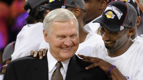 FILE - Los Angeles Lakers' Kobe Bryant gives basketball great Jerry West a shoulder rub after the Lakers beat the San Antonio Spurs in Game 5 of the NBA Western Conference basketball finals in Los Angeles, May 29, 2008. Jerry West, who was selected to the Basketball Hall of Fame three times in a legendary career as a player and executive and whose silhouette is considered to be the basis of the NBA logo, died Wednesday morning, June 12, 2024, the Los Angeles Clippers announced. He was 86. (AP Photo/Kevork Djansezian, File)