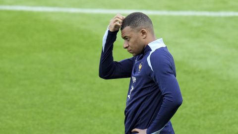 France's Kylian Mbappe gestures during a training session in Paderborn, Germany, Thursday, June 13, 2024. Mbappé was absent when the squad took part in an open practice session at its European Championship base on Thursday. France will play against Austria during their Group D soccer match at the Euro 2024 soccer tournament on June 17. (AP Photo/Hassan Ammar)