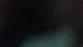 Boston Celtics center Al Horford, center, and forward Jayson Tatum, center left, celebrates with teammates near the Larry O'Brien Championship Trophy after the team won the NBA basketball championship with a Game 5 victory over the Dallas Mavericks, Monday, June 17, 2024, in Boston. (AP Photo/Charles Krupa)