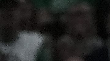 Boston Celtics forward Jayson Tatum, center, celebrates with to Celtics co-owner Stephen Pagliuca, center right, near the Larry O'Brien Championship Trophy after the Celtics won the NBA championship with a Game 5 victory over the Dallas Mavericks on Monday, June 17, 2024, in Boston. (AP Photo/Charles Krupa)