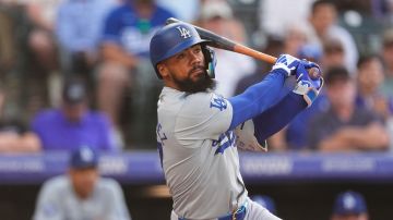 Los Angeles Dodgers fielder Teoscar Hernández (37) in the first inning of a baseball game Monday, June 17, 2024, in Denver. (AP Photo/David Zalubowski)