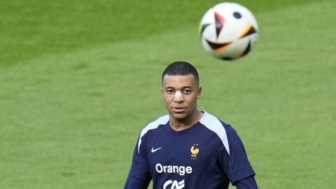 France's Kylian Mbappe eyes the ball during a training session in Paderborn, Germany, Wednesday, June 19, 2024. France will play against Netherland during their Group D soccer match at the Euro 2024 soccer tournament on June 21. (AP Photo/Hassan Ammar)