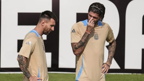 Lionel Messi, left, works out with his team, team Argentina during a practice before a COPA America soccer match, Wednesday, June 19, 2024, in Kennesaw, Ga. Argentina plays team Canada on June 20, in Atlanta. (AP Photo/Mike Stewart)