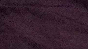 El mediocampista mexicano Edson Álvarez sentado en el banco después de lastimarse en el encuentro ante Jamaica.