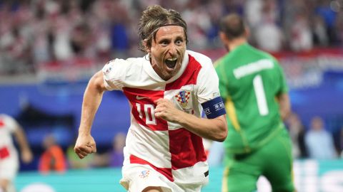 Croatia's Luka Modric celebrates after scoring his side's opening goal during a Group B match between Croatia and Italy at the Euro 2024 soccer tournament in Leipzig, Germany, Monday, June 24, 2024. (AP Photo/Ebrahim Noroozi)