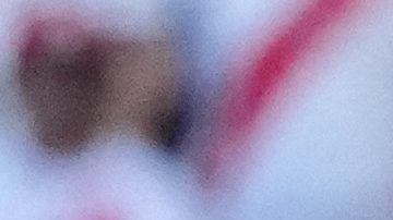 Canada's Tani Oluwaseyi, left, and Peru's Anderson Santamaria battle for the ball during a Copa America Group A soccer match in Kansas City, Kan., Tuesday, June 25, 2024. (AP Photo/Ed Zurga)