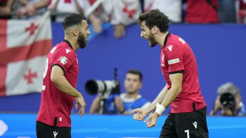 Georgia's Khvicha Kvaratskhelia celebrates after scoring his side's first goal during a Group F match between Georgia and Portugal at the Euro 2024 soccer tournament in Gelsenkirchen, Germany, Wednesday, June 26, 2024. (AP Photo/Alessandra Tarantino)