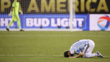 FILE - In this Sunday, June 26, 2016 photo, Argentina's Lionel Messi reacts to losing 4-2 to Chile in penalty kicks during the Copa America Centenario championship soccer match, in East Rutherford, N.J. The penalty shootout is a tense battle of wills over 12 yards (11 meters) that has increasingly become a huge part of soccer and an unavoidable feature of the knockout stage in the biggest competitions. (AP Photo/Julio Cortez, File)