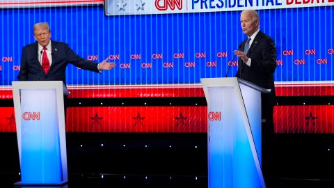 Republican presidential candidate former President Donald Trump, left, and President Joe Biden, right, speak simultaneously during a presidential debate hosted by CNN, Thursday, June 27, 2024, in Atlanta. (AP Photo/Gerald Herbert)
