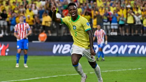 Brazil's Vinicius Junior celebrates scoring his side's third goal against Paraguay during a Copa America Group D soccer match in Las Vegas, Friday, June 28, 2024. (AP Photo/David Becker)