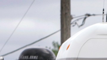 FILE - In this Wednesday, June 15, 2005, file photo, Winnebago motor homes are shown on a lot, in Jefferson, Iowa. Led by sales growth for towable RVs and pricier stand-alone motor homes, recreational vehicle makers expect to ship more than 300,000 units to dealers in 2013 for the first time since the economic downturn. (AP Photo/Charlie Neibergall, File)