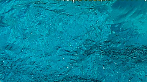 Simmers work out in a warm-up pool at the Los Angeles Invitational swimming meet at the University of Southern California, Thursday, July 17, 2014, in Los Angeles. (AP Photo/Mark J. Terrill)