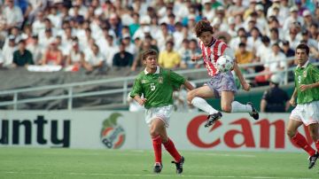 Frank Klopas, of the United States soccer team, right, intercepts a pass as Mexico?s Ramon Ramirez Cessna looks on during the first half at the Rose Bowl in Pasadena, California, on Saturday, June 4, 1994. The U.S. team won the exhibition game, 1-0. (AP Photo/Mark J. Terrill)
