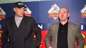 Germany`s heavy weight boxer Axel Schulz, left, and his coach Manfred Wolke, right, are seen during a press conference in the eastern German town of Riesa on Tuesday, October 27, 1998. Schulz will fly to a training camp in Phoenix/Arizona on October 28 to prepare for a fight against Mike Tyson that is scheduled for the beginning of 1999. (AP Photo/Matthias Rietschel)
