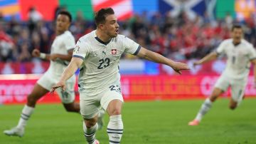 Cologne (Germany), 19/06/2024.- Xherdan Shaqiri of Switzerland celebrates scoring the equalizer during the UEFA EURO 2024 group A soccer match between Scotland and Switzerland, in Cologne, Germany, 19 June 2024. (Alemania, Suiza, Colonia) EFE/EPA/FRIEDEMANN VOGEL