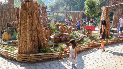 A young visitor takes a stroll through the Descanso Railroad © Descanso Gardens