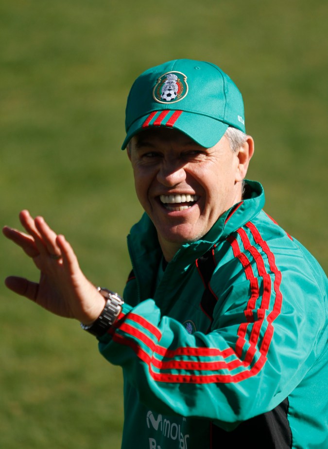 Mexico`s national team head coach Javier Aguirre jokes with the media as he arrives to a training session at the Waterstone college in Johannesburg, Wednesday, June 9, 2010. Mexico will play in Group A at the soccer World Cup scheduled to start on June 11. (AP Photo/Guillermo Arias)