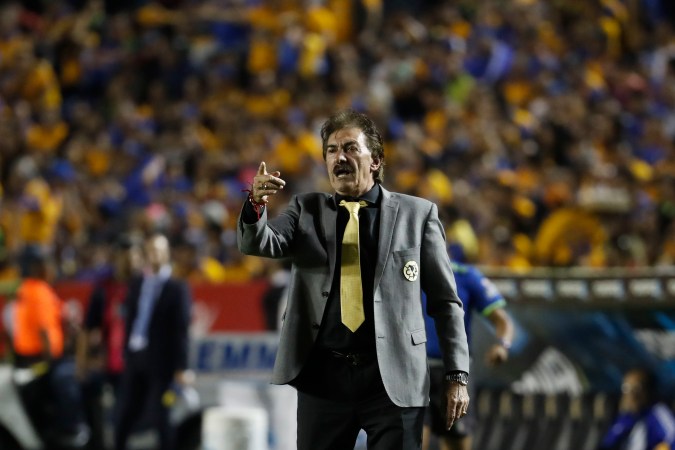 America coach Ricardo La Volpe gives instructions to his players from the sideline during the Mexican soccer league final match against Tigres in Monterrey, Mexico, Sunday, Dec. 25, 2016. (AP Photo/Eduardo Verdugo)