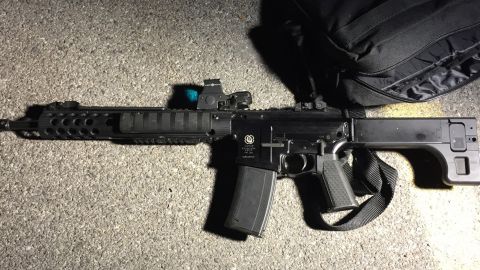 In this Tuesday, Nov. 14, 2017 photo provided by the Cheektowaga Police department is a weapon used in a shooting in Cheektowaga, N.Y. Authorities say it's a "miracle" that more people weren't shot when a man with two semi-automatic rifles opened fire on a suburban Buffalo retail store, wounding one man before being tackled by police. Police identified the suspect as Travis Green, 29, of Cheektowaga. He was arraigned Wednesday, Nov. 15, 2017 in town court on charges that included attempted murder, assault, criminal use of a firearm and resisting arrest. (Cheektowaga Police Department via AP)