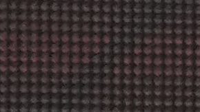 Ferrari driver Carlos Sainz of Spain celebrates after winning the British Formula One Grand Prix as Mercedes driver Lewis Hamilton of Britain, rear, looks on, at the Silverstone circuit, in Silverstone, England, Sunday, July 3, 2022. (AP Photo/Matt Dunham)