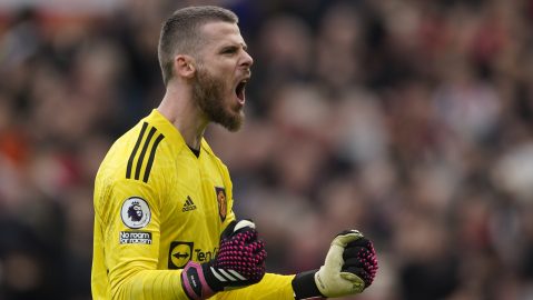 Manchester United's goalkeeper David de Gea celebrates after Manchester United's Marcus Rashford scored his side's opening goal during the English Premier League soccer match between Manchester United and Leicester City at the Stamford Bridge stadium in Manchester, England, Sunday, Feb. 19, 2023. (AP Photo/Dave Thompson)