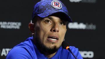 Cruz Azul defender Carlos Salcedo speaks during a press conference ahead of the team's Leagues Cup soccer match against Inter Miami, Thursday, July 20, 2023, in Fort Lauderdale, Fla. (AP Photo/Rebecca Blackwell)